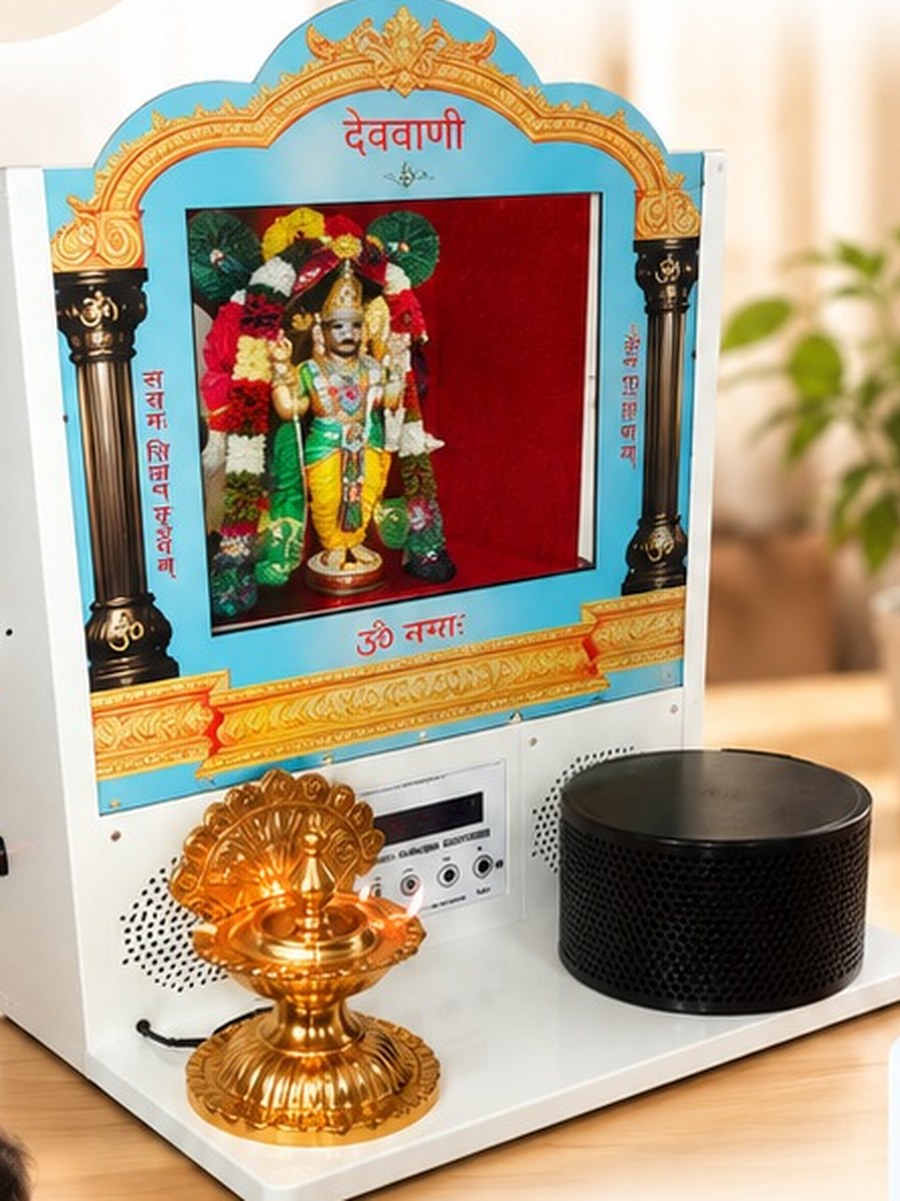 Vedavani home temple device with an illuminated deity panel, brass lamp and speaker